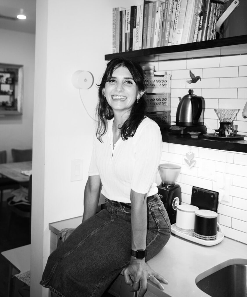 headshot of gabriella in her kitchen